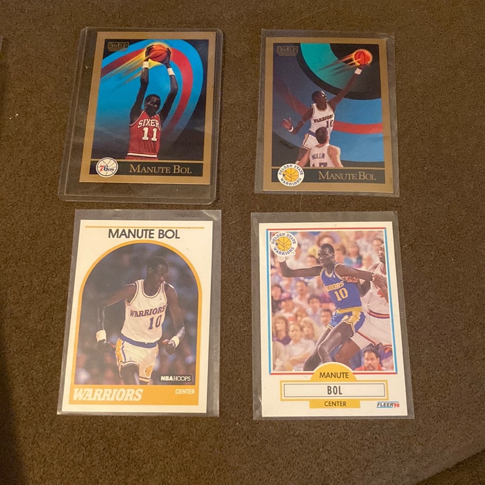 NBA Manute Bol basketball trading card lot of four cards